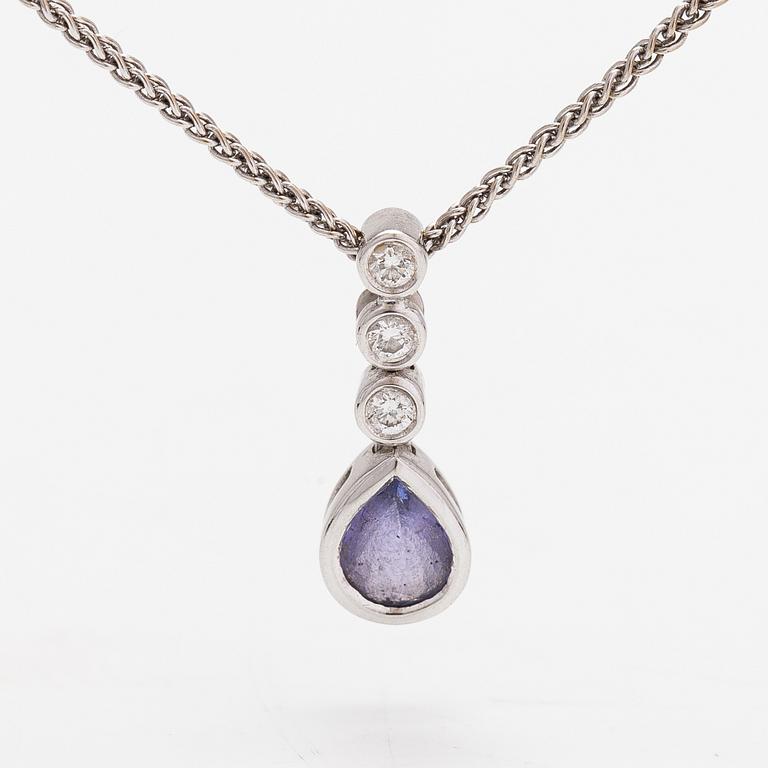 An 18K white gold necklace with a tanzanite and diamonds ca. 0.06 ct in total.