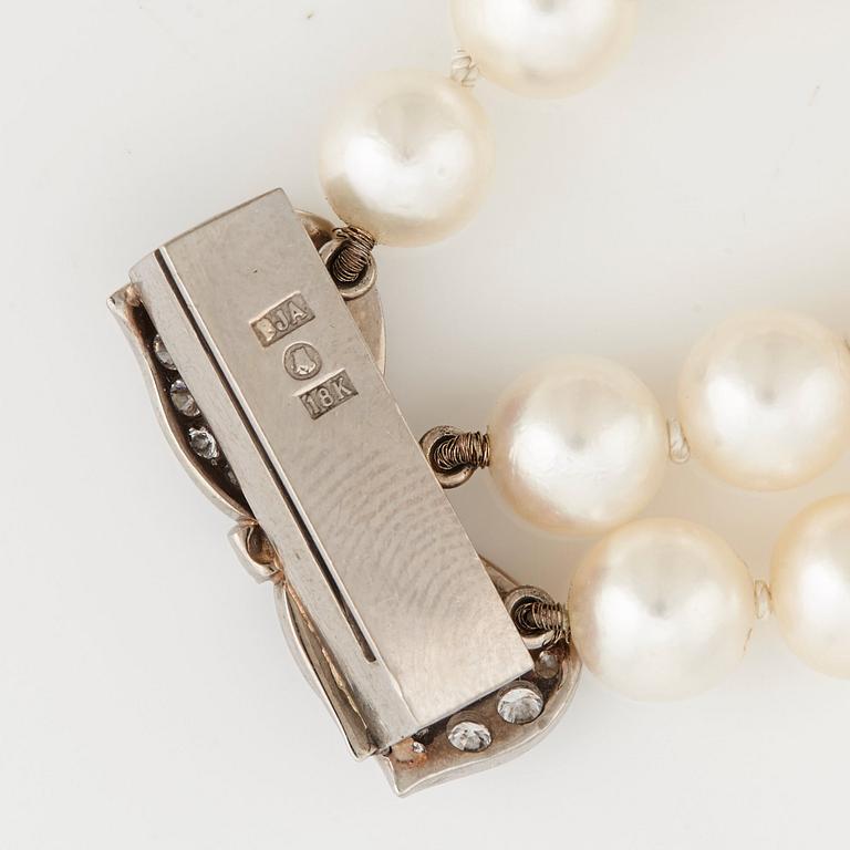 A cultured pearl and brilliant-cut diamond bracelet.