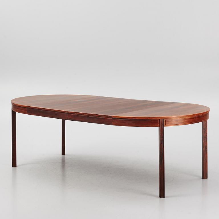 Bertil Fridhagen, a rosewood-veneered dining table with four chairs, BOdsfors, Sweden, 1960's.