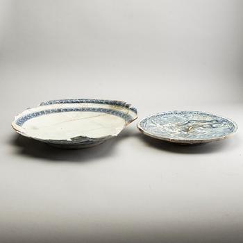 Two large blue and white Persian chargers, 18th/19th Century. Study pieces, fragments.