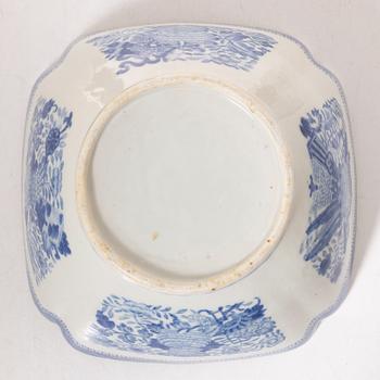A group  of three serving dishes, a serving bowl, a cup, and seven plates, porcelain, including China 18th century.