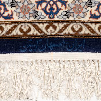 An Isfahan rug, c. 220 x 145 cm.