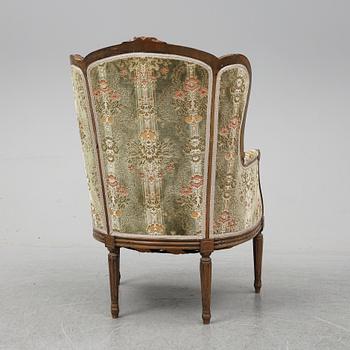 A Louis XVI style armchair from around year 1900-.