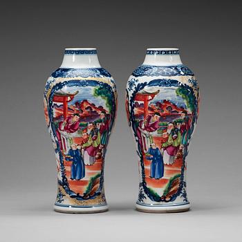 284. A pair of famille rose vases, Qing dynasty, Qianlong (1736-95).