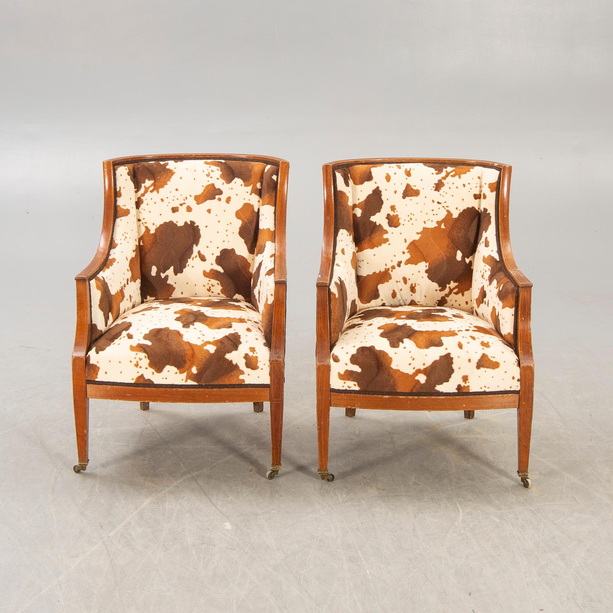A pair of mahogany armchairs early 1900s.