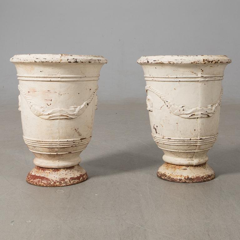 Urnor ett par gjutjärn omkring 1900.