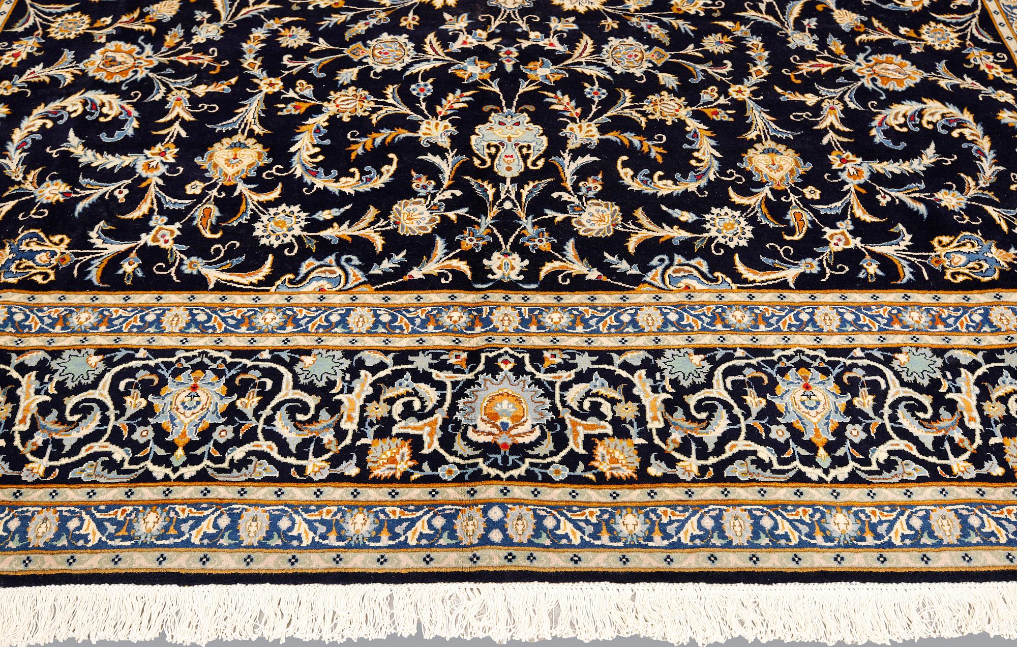 A Keshan carpet, c. 450 x 322 cm.