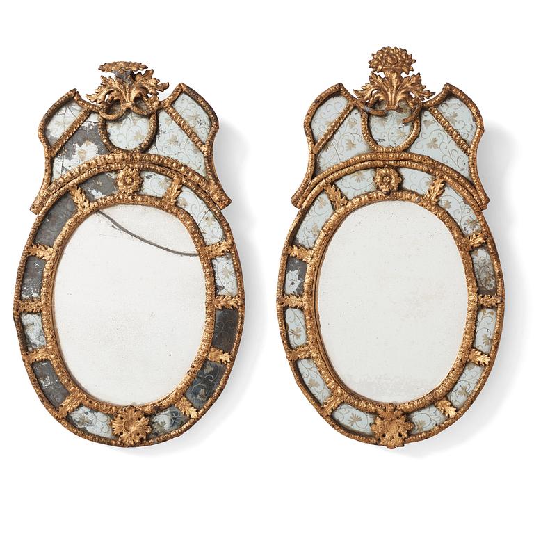 A pair of Swedish Baroque girandoles in the manner of B Precht (Stockholm 1674-1738).