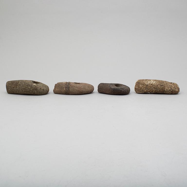 Four late neolithic stone axes.