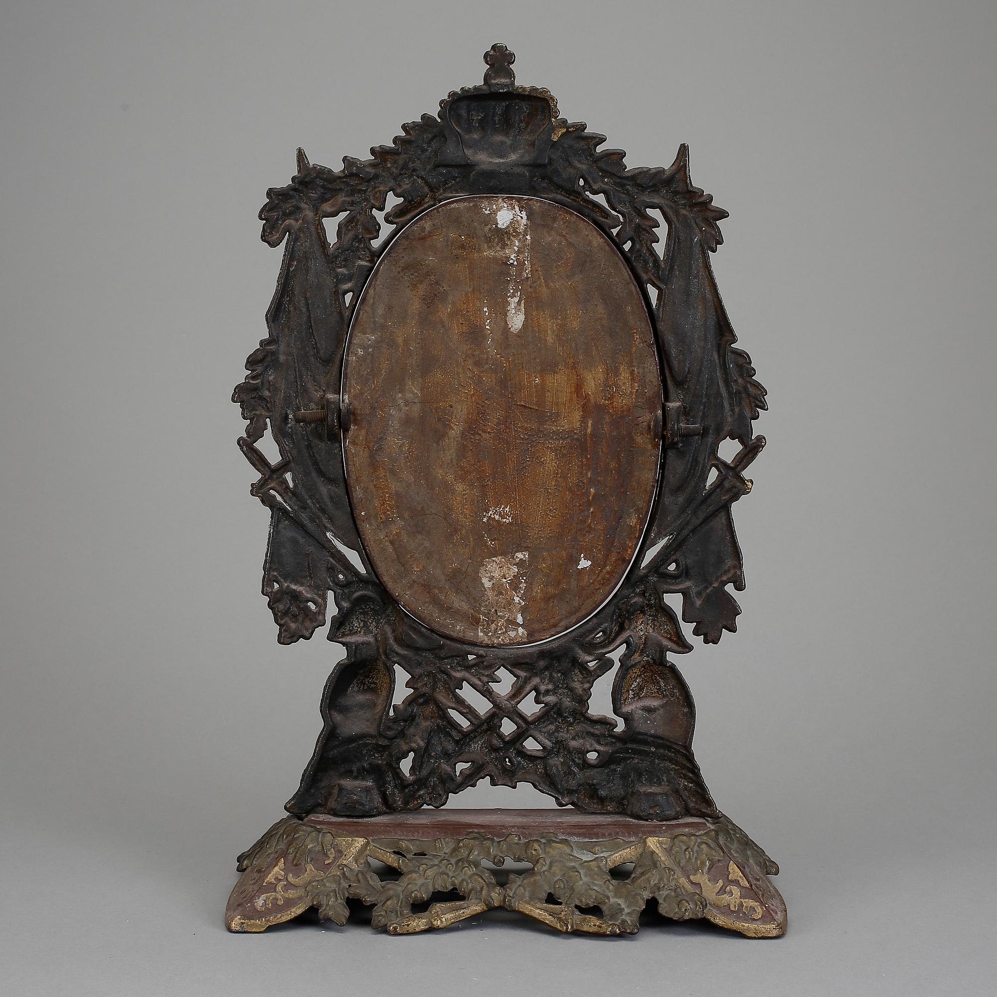 BORDSSPEGEL, gjutjärn, sannolikt Huseby bruk. 1800-talets slut.