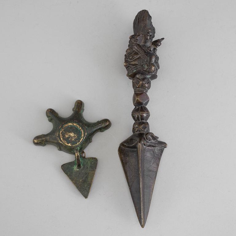 An early 20th century Tibetian bronze Phurba (ritual dagger) and censor.