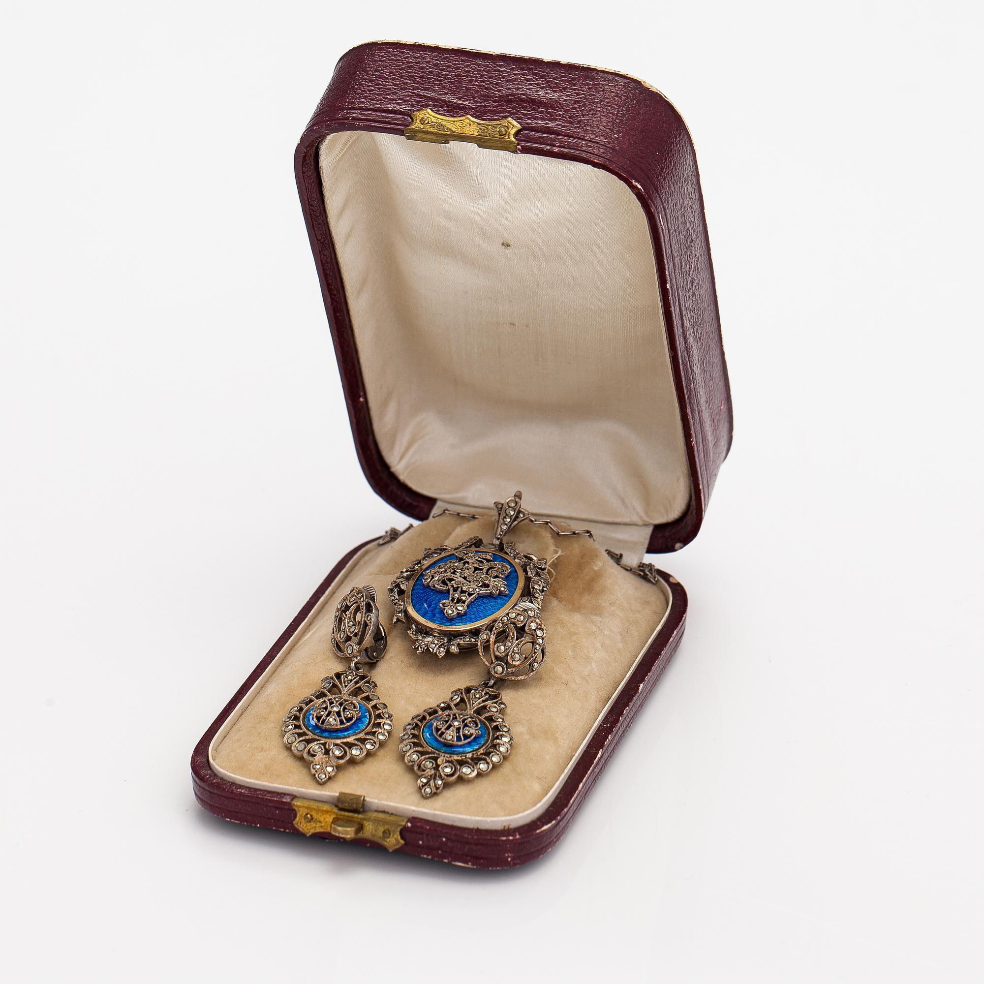 A necklace and a pair of earrings made of silver with enamel and marcasites. Paris, turn of the 20th century.