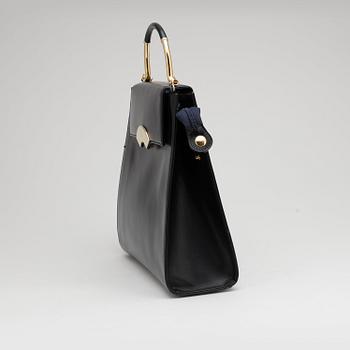 KARL LAGERFELD, a dark blue leather top handle bag.