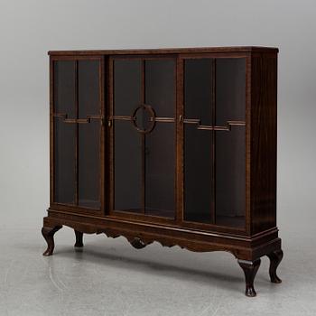 A 1920's/30's vitrine cabinet.