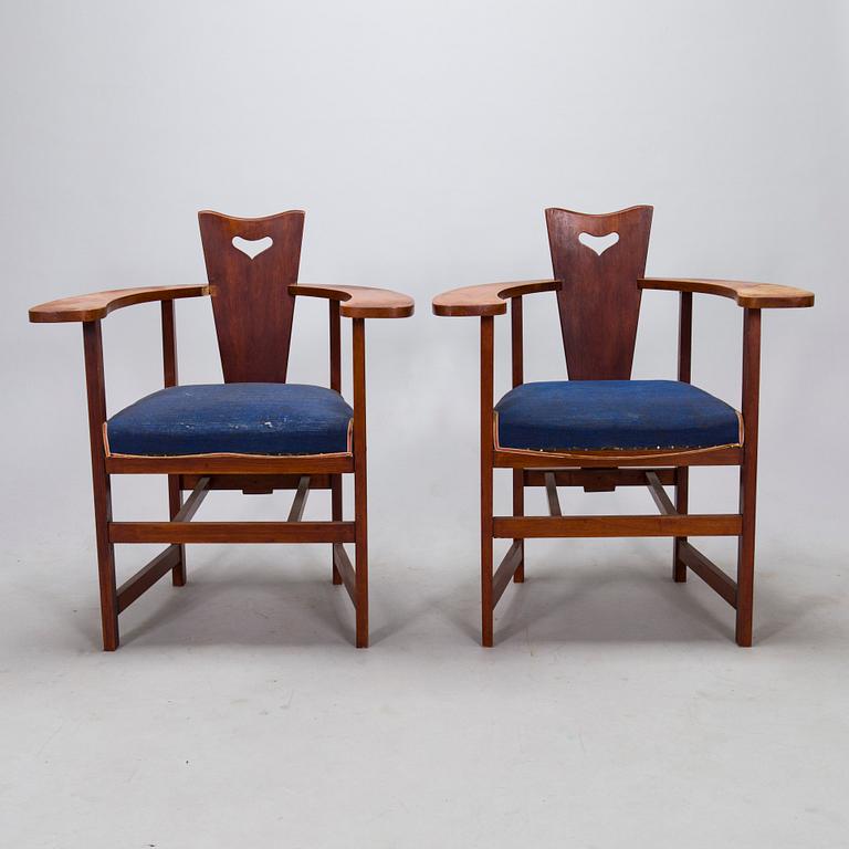 A pair of Arts and Crafts armchairs, early 20th century.