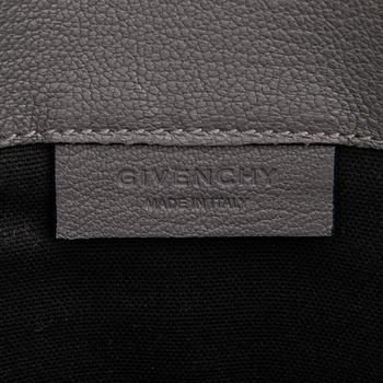 Givenchy, A 'Antigona' goat leather clutch.