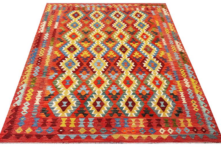 A Kelim carpet, c. 291 x 196 cm.