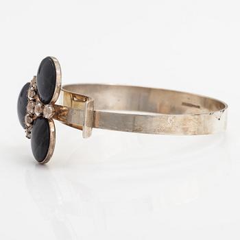 Elis Kauppi, A sterling silver bracelet "Tunturipuro" with spectrolites and rock crystals. Kupittaan kulta, Turku 1960's.