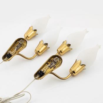 A pair of 'Tulip' brass wall lights, Fog & Mørup, mid 20th Century.