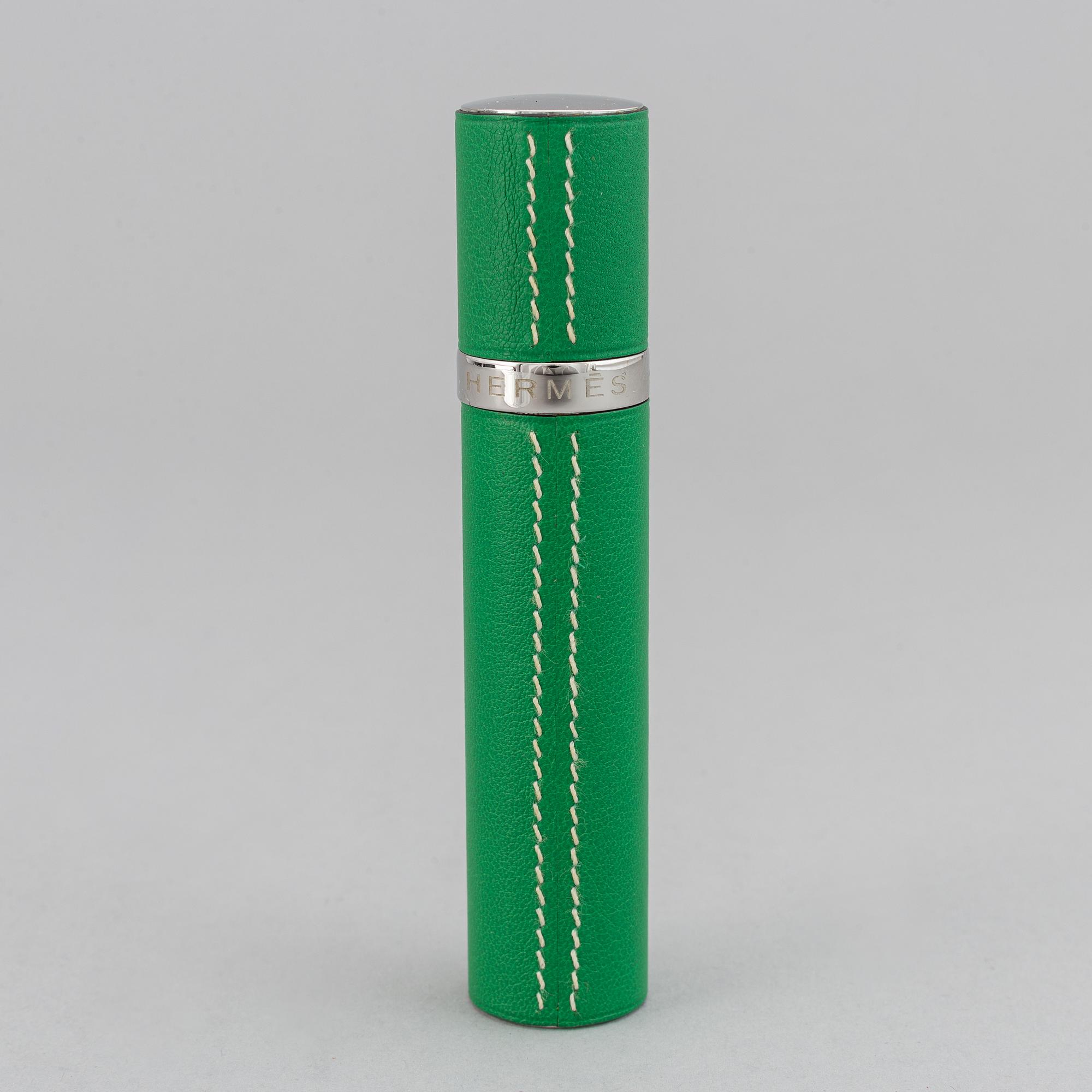 Hermès, refillable perfume bottle in leather.