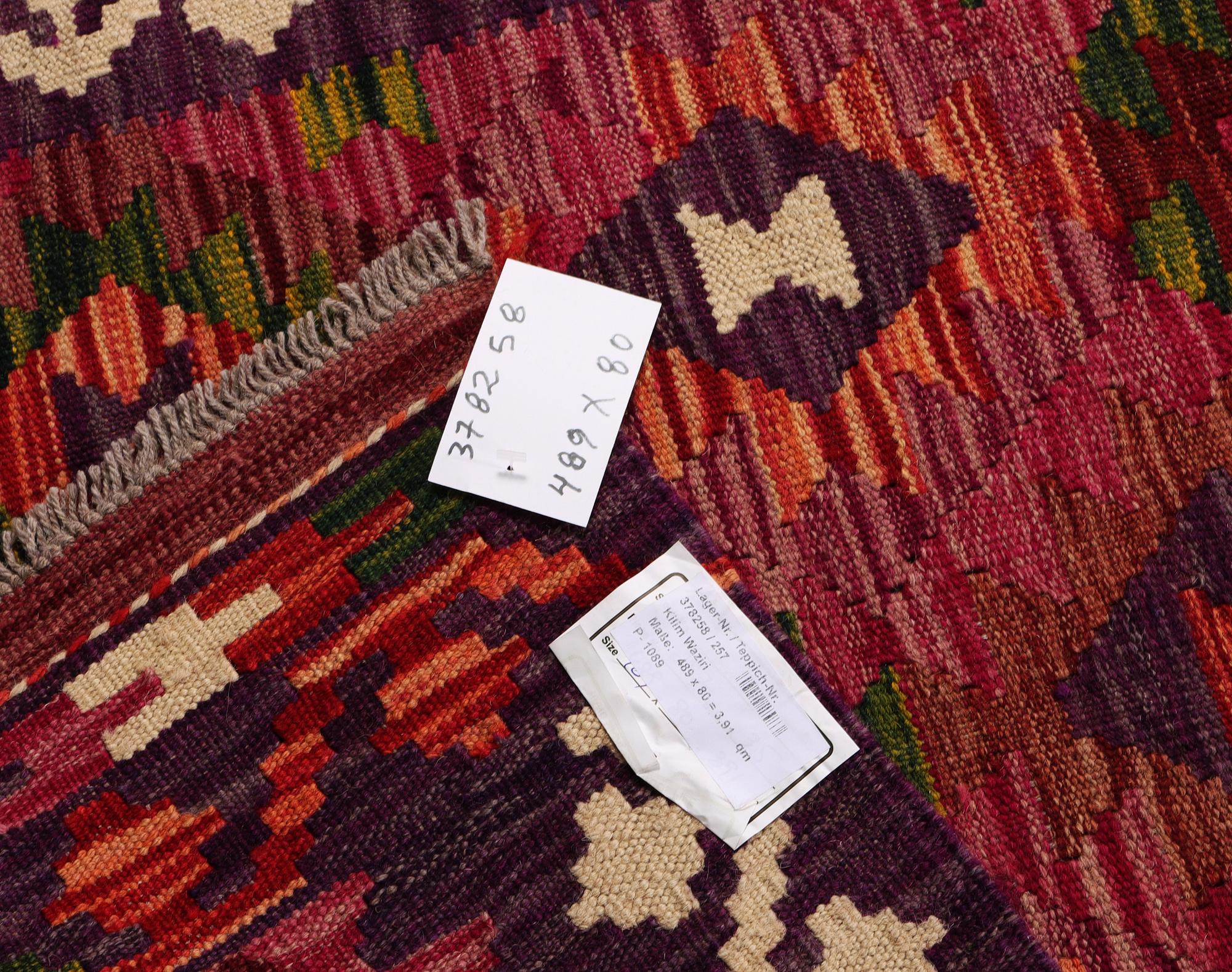 A Kilim runner carpet, c. 489 x 80 cm.