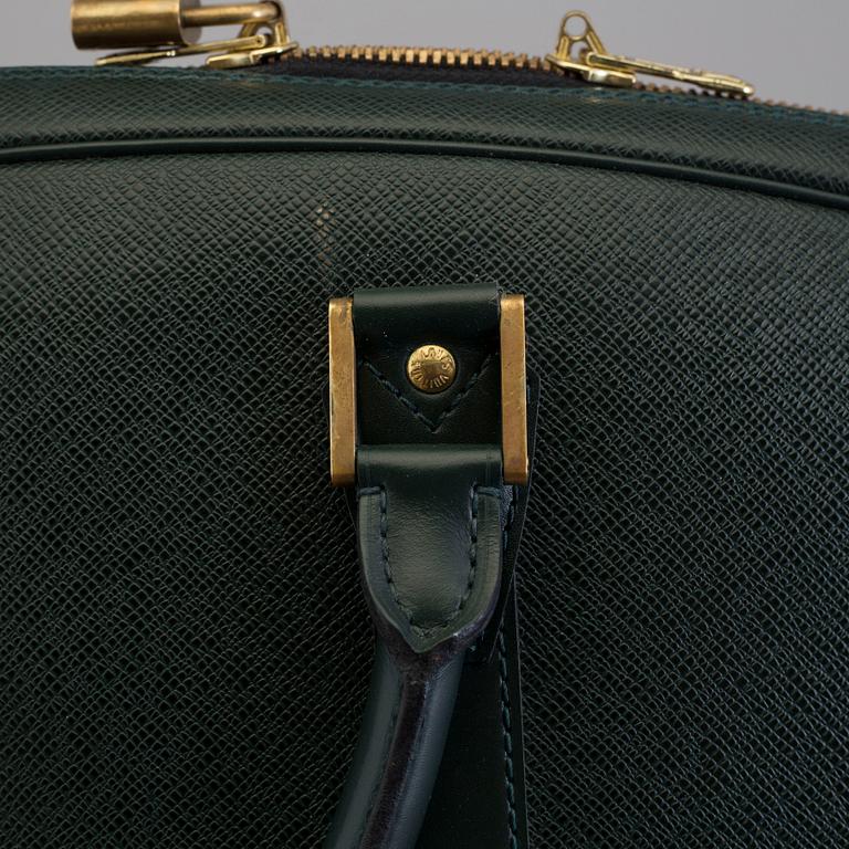 LOUIS VUITTON, a taiga leather 'Helanga' weekend bag.
