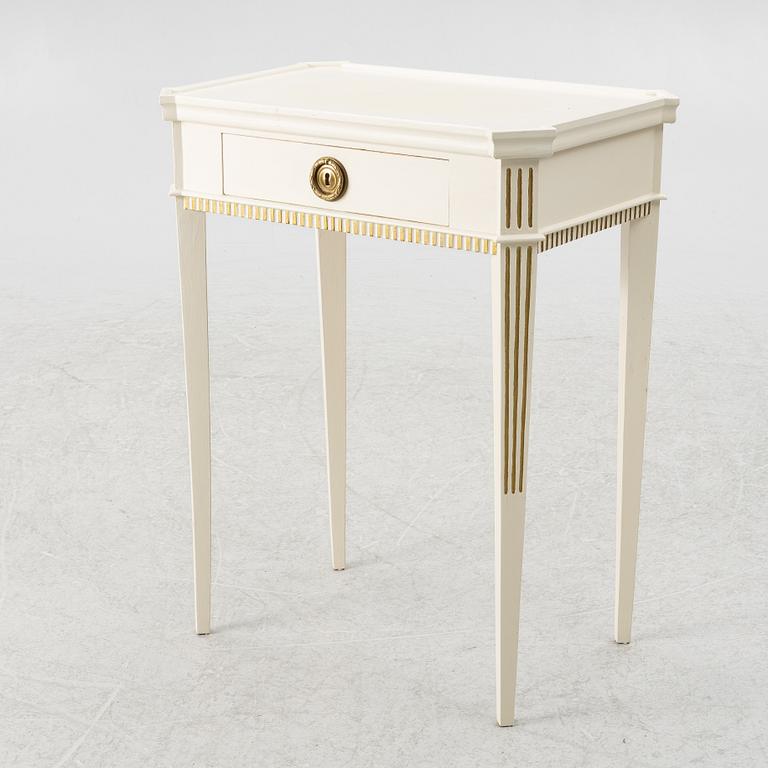 A Gustavian style side table, early 20th century.