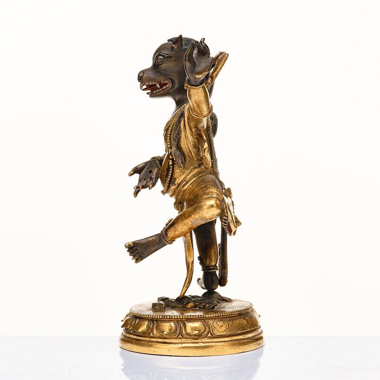 BJÖRNHÖVDAD DAKINI, patinerad kopparlegering. Tibetokinesisk, sent 1700-tal/omkring 1800.