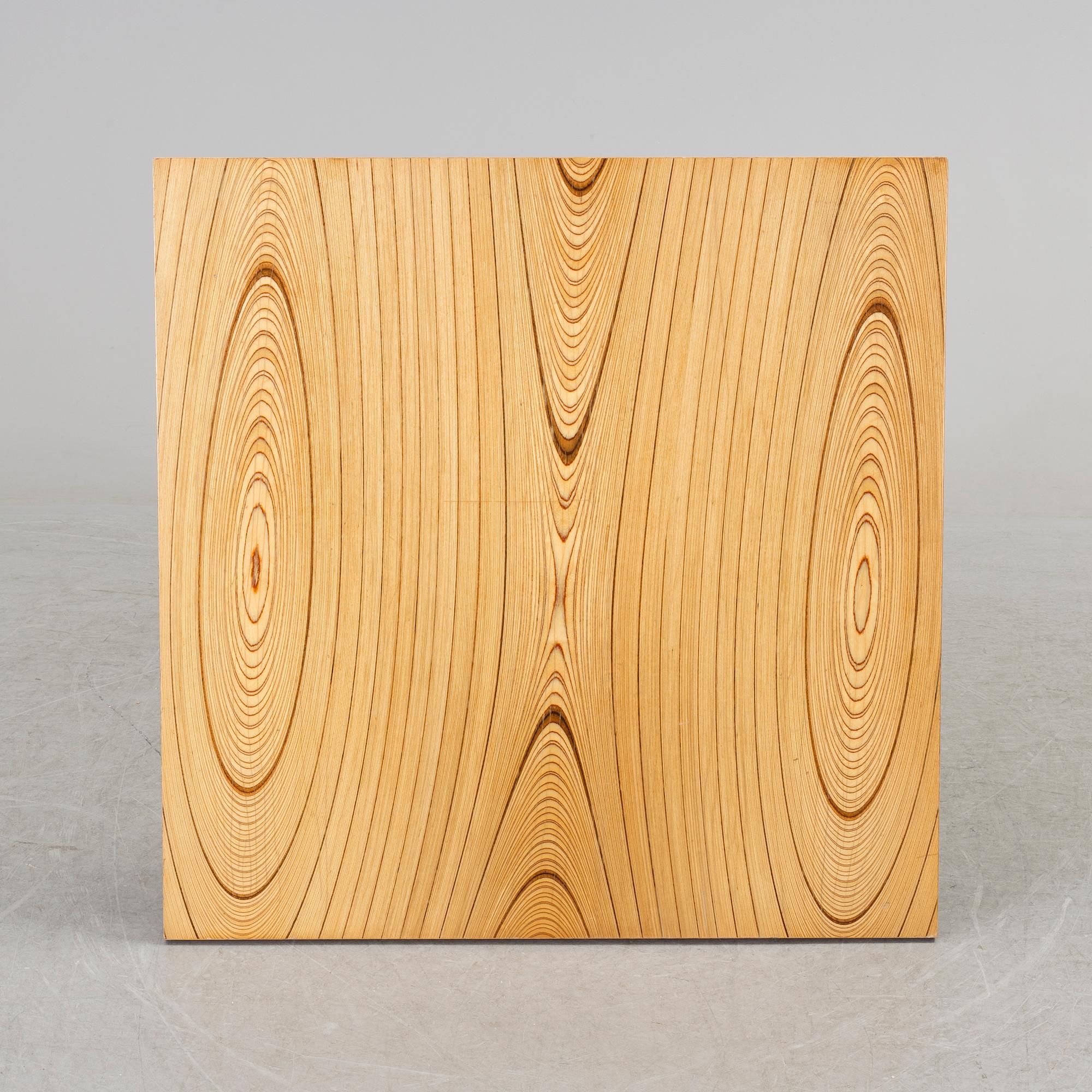 A coffee table marked Tapio Wirkkala, Asko, Made in Finland.