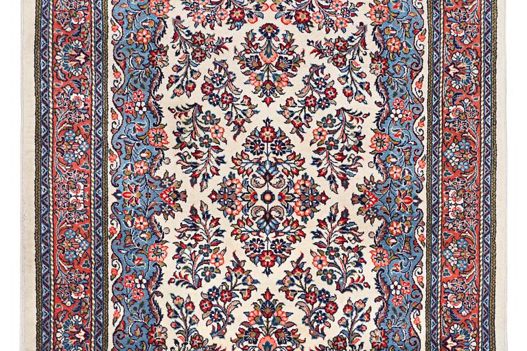 A rug, Sarouk, c. 210 x 137 cm.