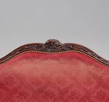 A Louis XV mid 18th century sofa.