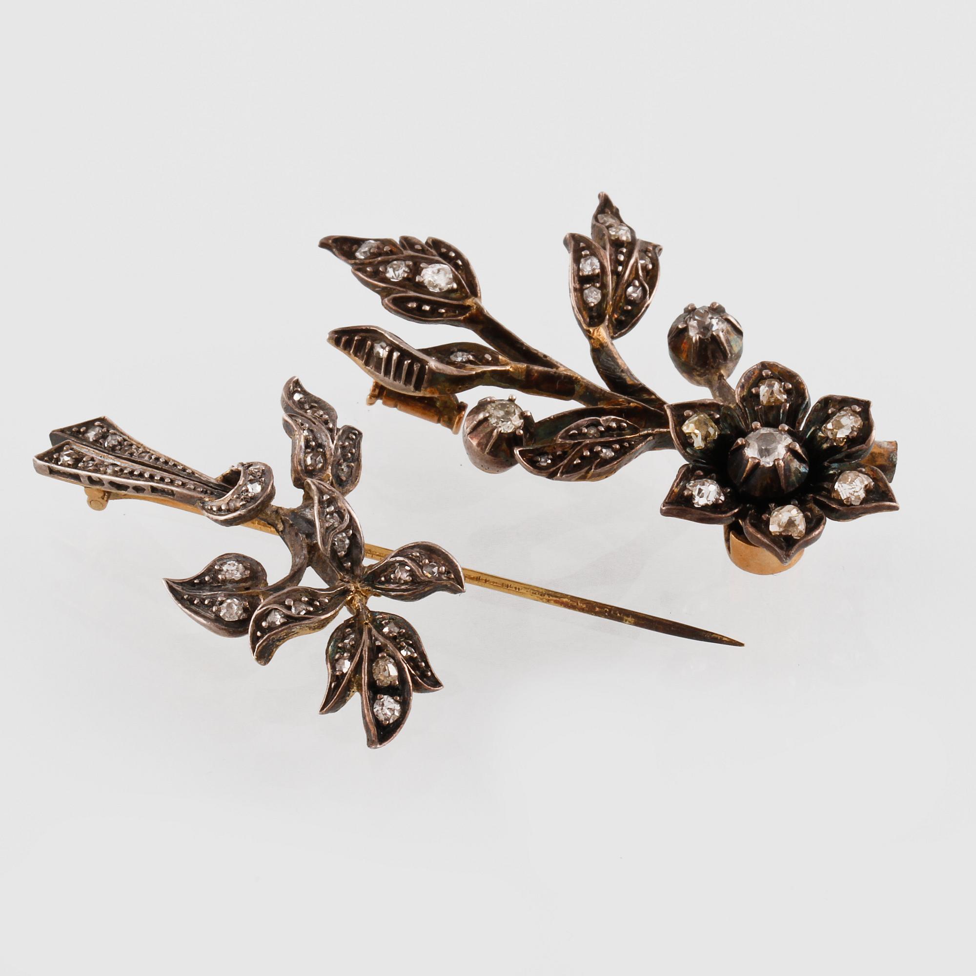 BROSCH, silver samt guld med gammalslipade diamanter. Vikt 14,4 gram.