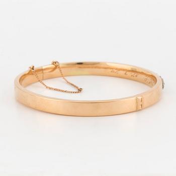 ARMRING med cabochonslipade turkoser.