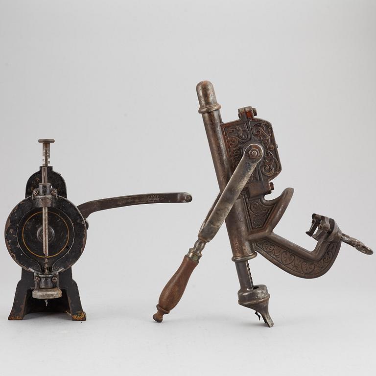 Two wine bottle openers, one Eskilstuna, circa 1900.