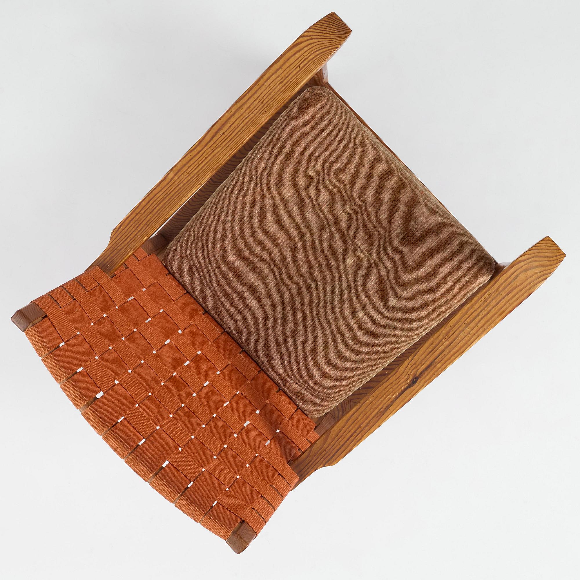 Axel Einar Hjorth, a stained pine "Väddö" easy chair, Nordiska Kompaniet, Sweden, 1930s-40s.