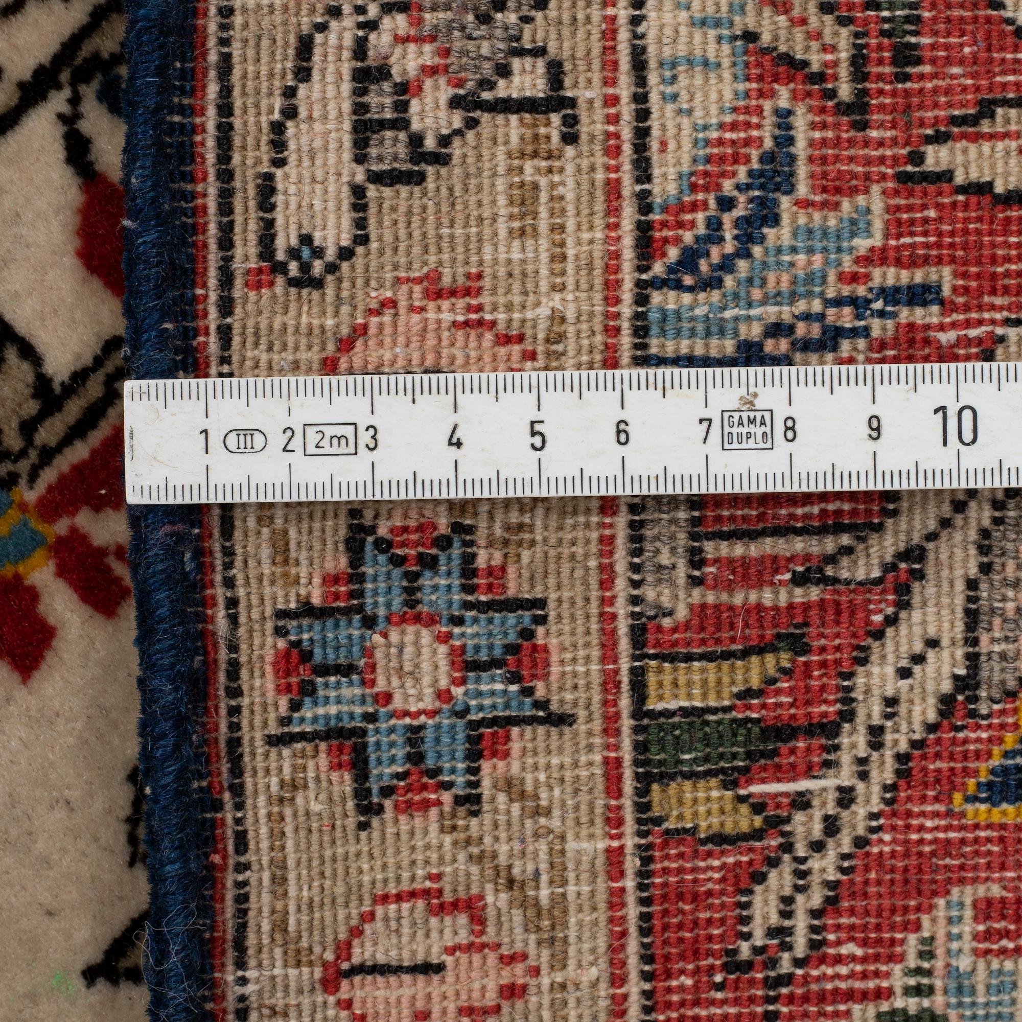 A RUG, an old Qum, figural, Iranian, ca 211-213,5 x 143,5-148 cm.