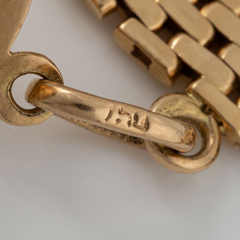 Armband med berlocker guld 18K guld.