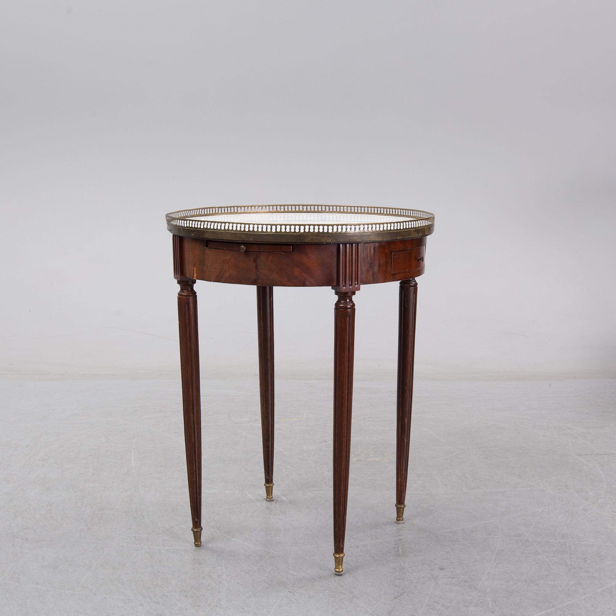 A Louis XVI style marble top mahognay table, circa 1900.