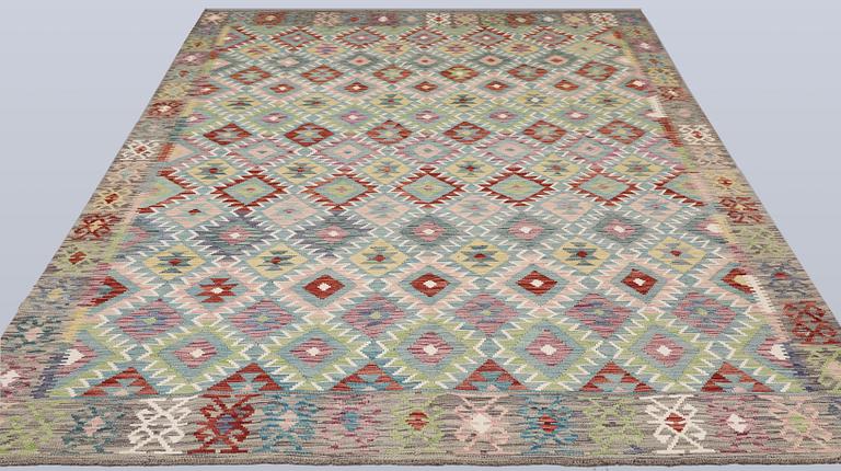 A Killim rug, approx. 295 x 204 cm.