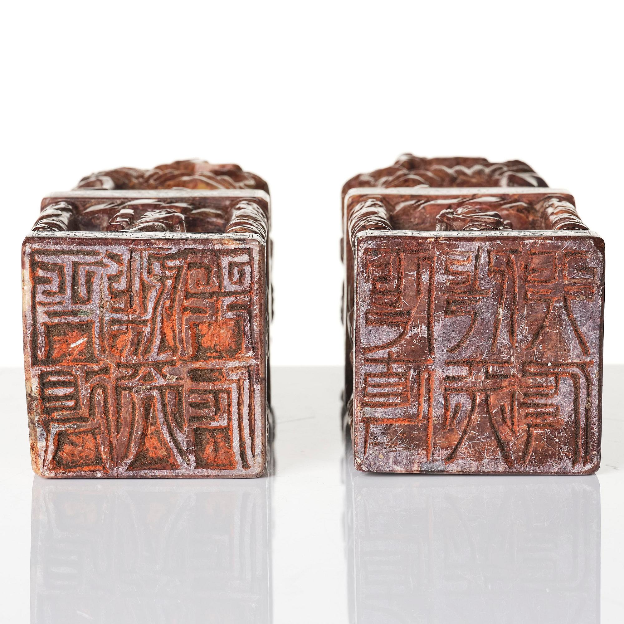 A pair of large soapstone seal stamps, late Qing dynasty/circa 1900.