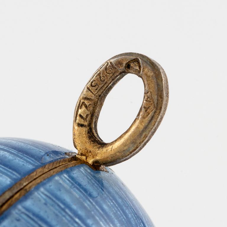 Pendant in the form of an egg, silver and enamel.