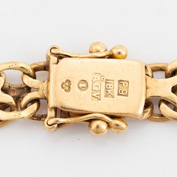 18K gold bracelet, with charms.