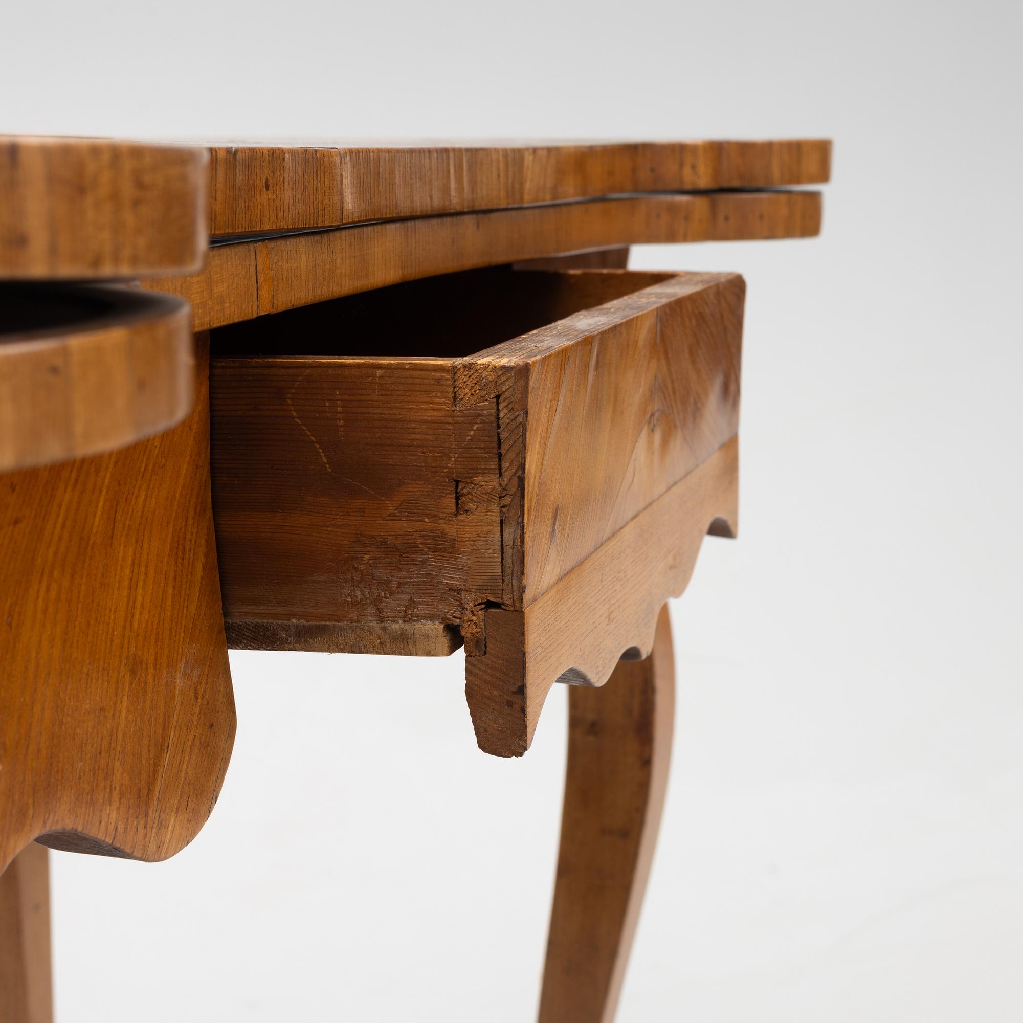 A rococo card table, mid 18th century.