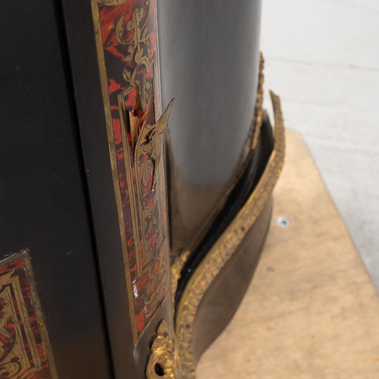A Boulle style cabinet, the end of the 19th century.