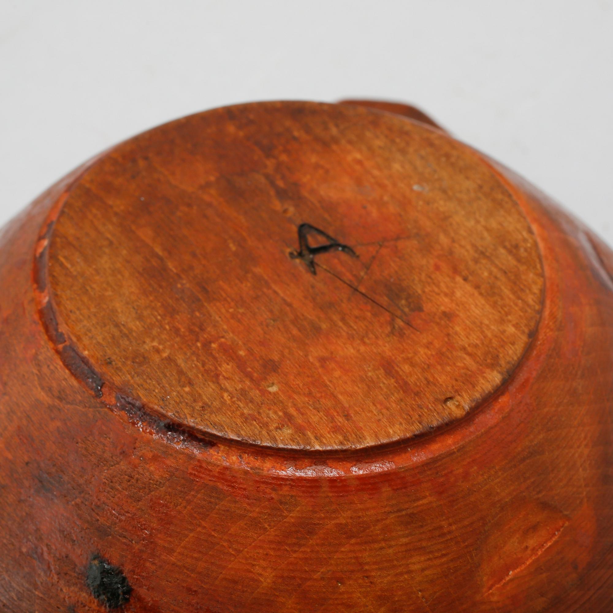 A wooden folk art bowl from 1780.