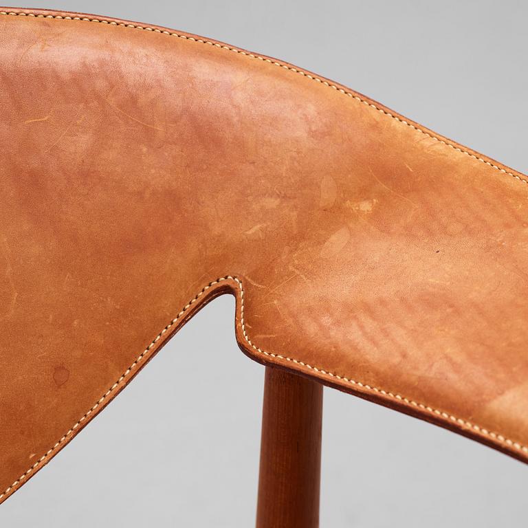 Aksel Bender Madsen & Ejner Larsen, a teak and leather "Metropolitan Chair", Willy Beck, Denmark 1950-60's.