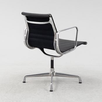 An EA 108 swivel office chair by Charles and Ray Eames for Vitra.