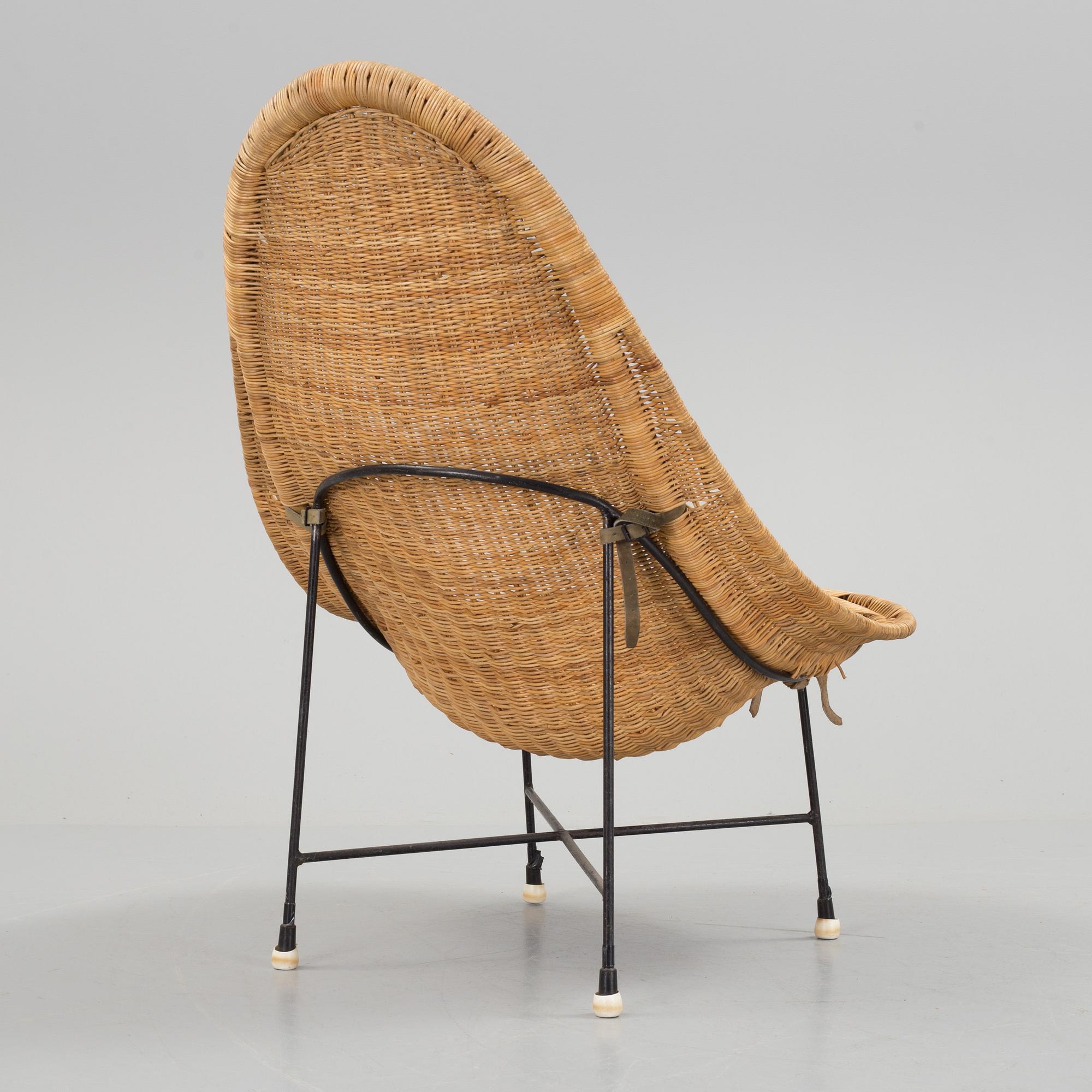 A 'Stora Kraal' rattan easy chair from Nordiska Kompaniet, 1950's.