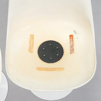 Eero Saarinen, A 'Tulip' furniture set, table with eight chairs, Knoll International, 1970s.