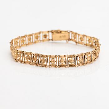 A 14K gold bracelet. Kallion kulta ja kello, Helsinki 1926.